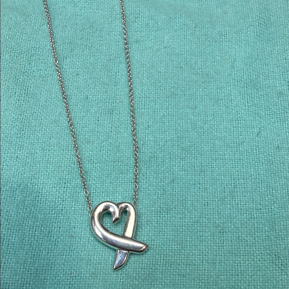 TIFFANY & CO. Silver Heart Ribbon Pendant Necklace - Women Jewelry